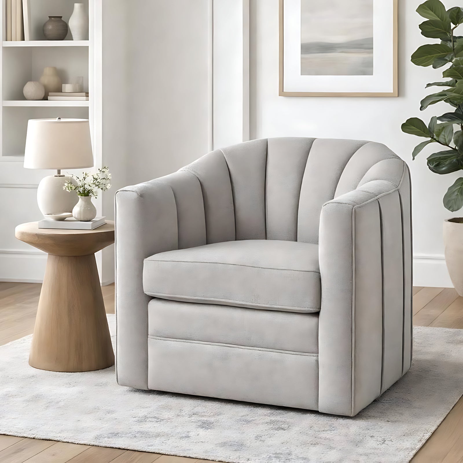 Oatmeal armchair in a living room setting with a side table and decor.