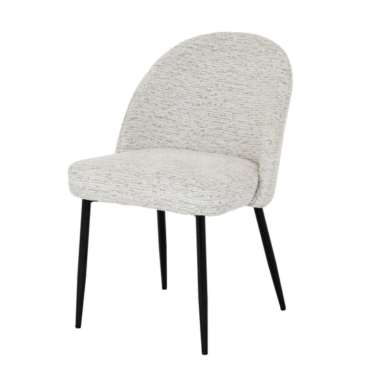 White textured chair with black legs on a white background